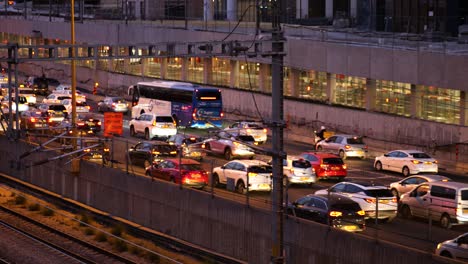Busy-multi-lane-car-traffic-in-the-evening-in-Tel-Aviv,-Israel
