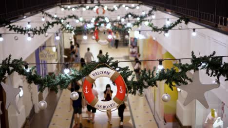 Welcome-on-board-float-is-hang-with-Christmas-tree-leaves-at-Straits-Quay