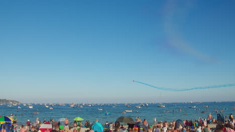 Crowd-Of-People-Watching-Red-Arrows-Display-Over-Cornwall-During-Falmouth-Week-Event-In-England