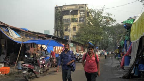 Static-shot-of-people-walking-through-the-streets-of-Islamic-community-of-Wadala-close-to-railway-station