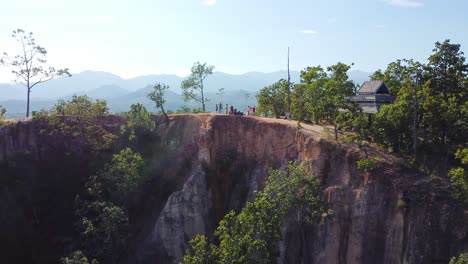 Tourists-above-the-canyon-in-Pai,-Thailand