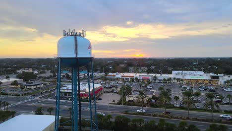 Jacksonville-Beach-FL-Water-Tower-and-A1A-at-Sunset-Facing-West---Aerial-Ascending