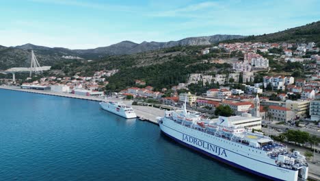 Jadrolinja-Ship-moored-in-Dubrovnik-Croatia-drone-panning-view
