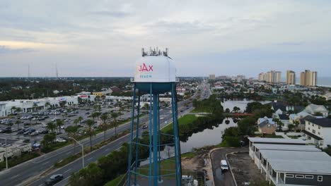 Jacksonville-Beach-FL-Water-Tower-and-A1A-at-Dusk---Orbiting-Left-Revealing-Beach