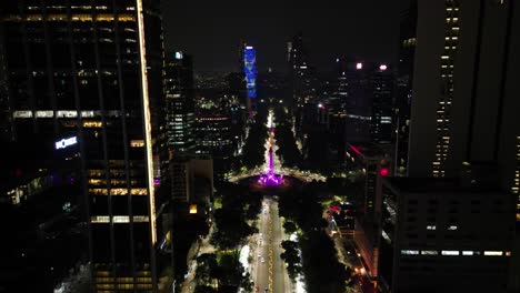 Panoramic-aerial-view-of-the-Angel-of-Independence-roundabout-in-Reforma-avenue-at-night,-Mexico-City,-23-october-2022