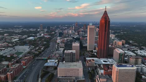 High-aerial-view-of-Atlanta-Georgia-skyscraper-towers-at-night