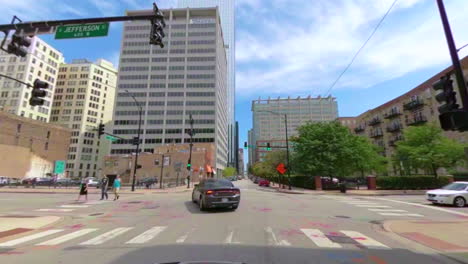 Driving-in-suburbs-of-Chicago-downtown-towards-the-last-mile-of-Route-66-with-turning-in-street-crossings
