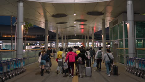 Passengers-Walking-In-The-Airport-At-Night