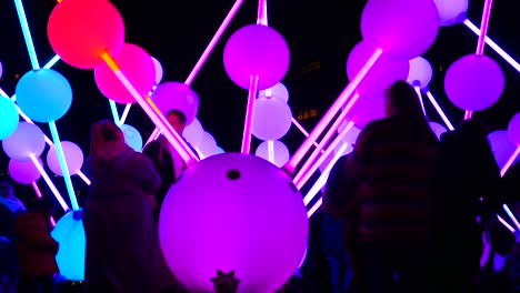 People-interacting-with-touch-illuminated-Affinity-neuron-artwork,-Chavasse-park,-Liverpool-River-of-light