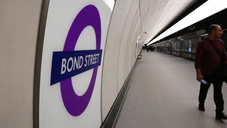 Walking-through-Bond-Street-Elizabeth-Line-Station,-London,-United-Kingdom