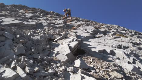 Hiker-ascending-scrambling-climbing-approached-Kananaskis-Alberta-Canada