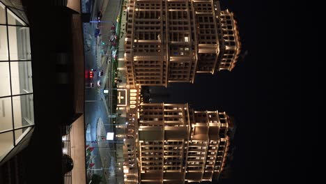 Ritz-Carlton-luxury-hotel-in-Amman,-Jordan-at-nighttime-establishing-shot-in-vertical-orientation