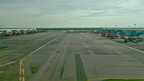 Time-Lapse-of-Parked-Airplanes-at-Terminal-beeing-Prepared-for-next-Flight