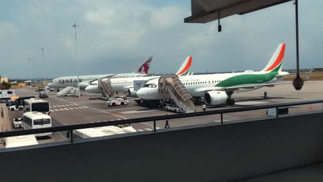 Slow-Travelling-Wide-Shot-of-Airplanes-at-Abidjan-Félix-Houphouët-Boigny-International-Airport