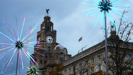 Liver-building-sightseeing-flashing-neon-electric-dandelions-artwork-at-Liverpool-city-pier-head-river-of-light-event