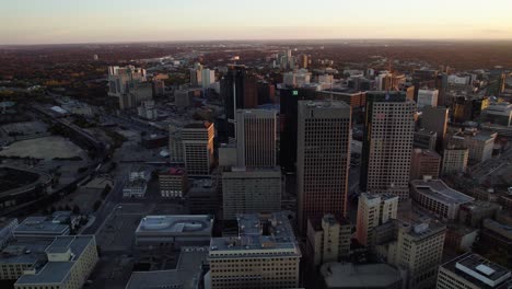 Aerial-view-around-downtown-Winnipeg,-fall,-sunset-in-Canada---circling,-drone-shot