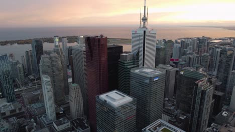 Skyline-of-downtown-Toronto,-Ontario,-Canada,-during-sunset--aerial-view