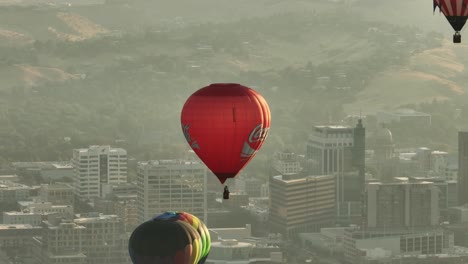 Aerial-view-of-a-Coca-Cola-hot-air-balloon-in-Boise,-Idaho