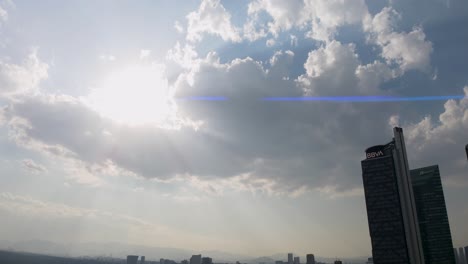 Drone-rotation-revealing-Reforma-avenue-skyscrapers-at-day-light