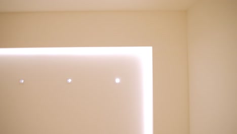 right-angle-of-ceiling,-wall-or-structure-with-leds-already-on,-the-outline-of-this-right-angle-lights-up-with-a-bright-yellow-light