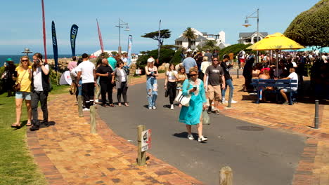 Tourists-walking-around-Hermanus-Waterfront-during-Whale-Festival