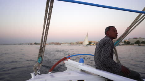 Nilo-river-at-sunset,-sailing-cruising-the-famous-Egyptian-river