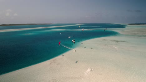 People-enjoy-kite-safary-on-reef-barrier-sebastopol,-Los-Roques-Archipelago