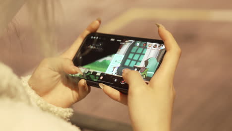 A-girl-playing-games-application.-modern-game-technology