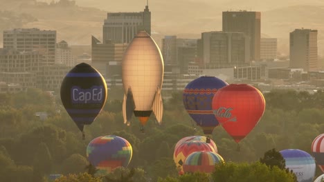 Branded-hot-air-balloons-taking-off-during-a-festival