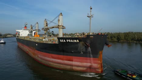 Vessel-Sea-Prajna-Bulk-carrier-as-it-docks-at-Puttershoek-harbour,-Netherlands