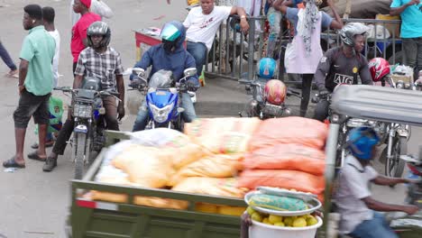 Commercial-Motorcycle-Riders-wait-for-Passengers-at-Local-Downtown-Market