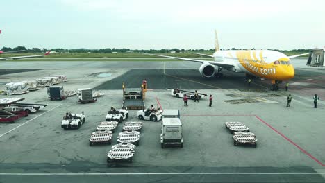 Time-lapse-ground-staff-Preparing-the-aircraft-before-flight-Loading-of-baggage-Food-for-flight-services-and-equipment-before-boarding-the-airplane