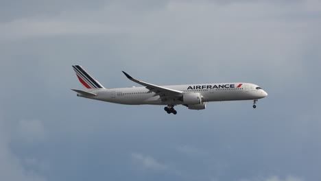 Airfrance-commercial-liner-landing-in-airport-against-cloudy-sky