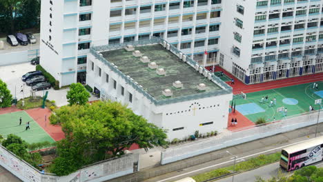 View-of-the-high-school-building-and-students-activities-during-recess