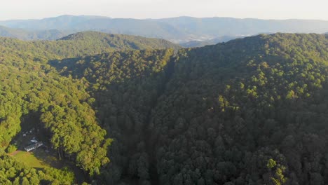 4K-Drone-Video-Flying-High-Above-Trees-in-Smoky-Mountains-near-Appalachian-Trail-along-North-Carolina-and-Tennessee-Border-on-Foggy-Morning