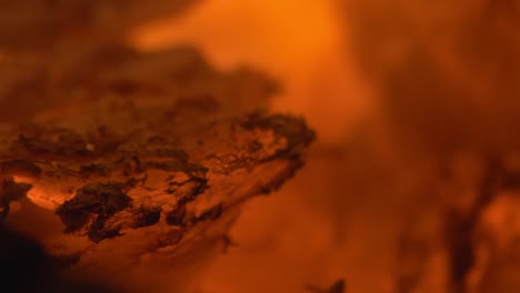 Extreme-Close-Up-Of-Glowing-Embers-On-Burning-Woods-In-The-Fireplace