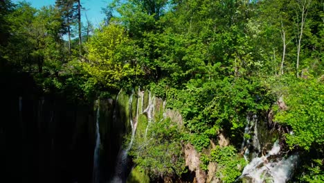 Aerial-of-beautiful-natural-and-green-water-fall-in-Plitvice-lakes-in-Croatian-national-park-"Plitvička-jezera