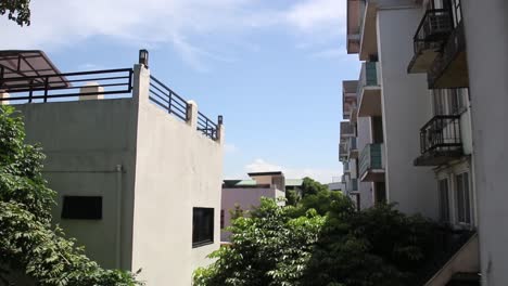 static-shot-of-roof-top-across-low-rise-condominium
