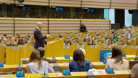 President-Charles-Michel-surrounded-by-EU-representatives-talking-in-the-plenary-room-of-the-European-Parliament---Brussels,-Belgium