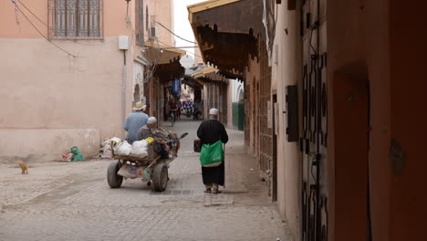 Old-Moroccan-People-Traveling-On-The-Street-Of-Marrakesh-In-Morocco