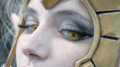 Close-up-shot-of-a-woman-in-cosplay-with-bright-yellow-contacts