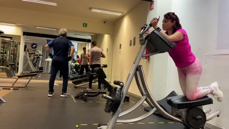 shot-of-people-doing-various-exercises-in-a-gym-in-Mexico-city-downtown