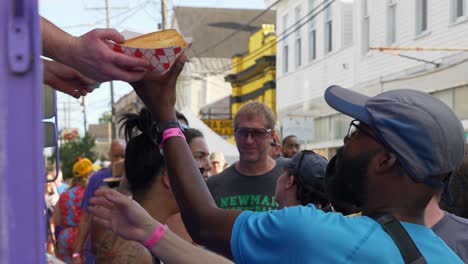 Crowd-at-food-truck-receives-orders-poboy-festival-New-Orleans-Day