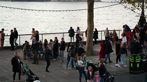 Children-playing-with-buggies-within-Southbank,-London,-United-Kingdom