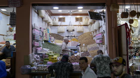 Man-selling-various-types-of-nuts-in-Marrakesh,-Morocco