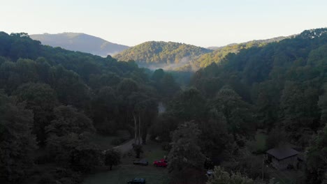 4K-Drone-Video-Flying-Over-Trees-of-Smoky-Mountains-near-Asheville,-NC-on-Foggy-Morning