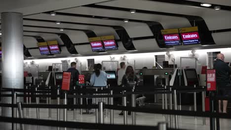 6-November-2022:-Emirates-Airline-Check-In-Counter-At-Terminal-3-In-Heathrow-Airport