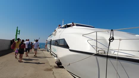 Passenger-Waiting-To-Board-The-Catamaran,-medium-shoot,-Croatia