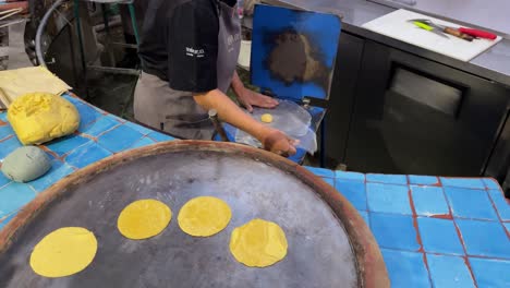 slow-motion-shot-of-a-person-preparing-tortillas