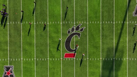 American-football-game-inside-the-Nippert-Stadium,-at-the-University-of-Cincinnati,-USA---Aerial-view